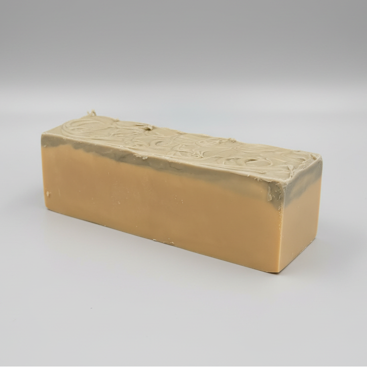 Rectangular block of soap on a gray background